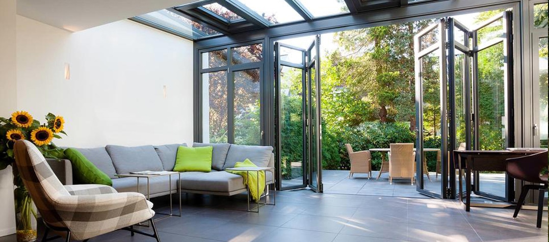 Our very own Solarlux Wintergarden within our showroom with both Highline & Ecoline bi-fold doors on show. 6 home improvements wiltshire