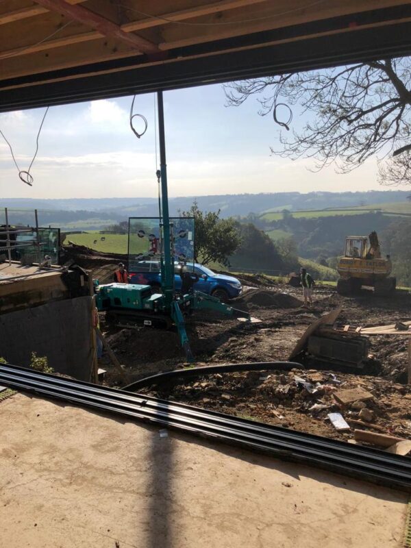 A Solarlux Cero installation with a little help of course from our glass lifting friends Kranlyft. 6 outside view of construction site with machinaries