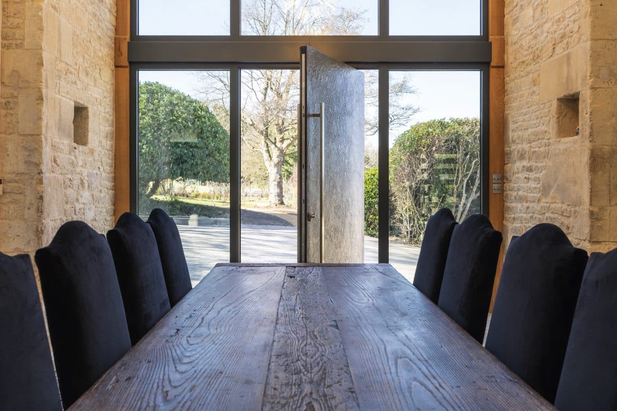 pivot door in a dining room/reception area