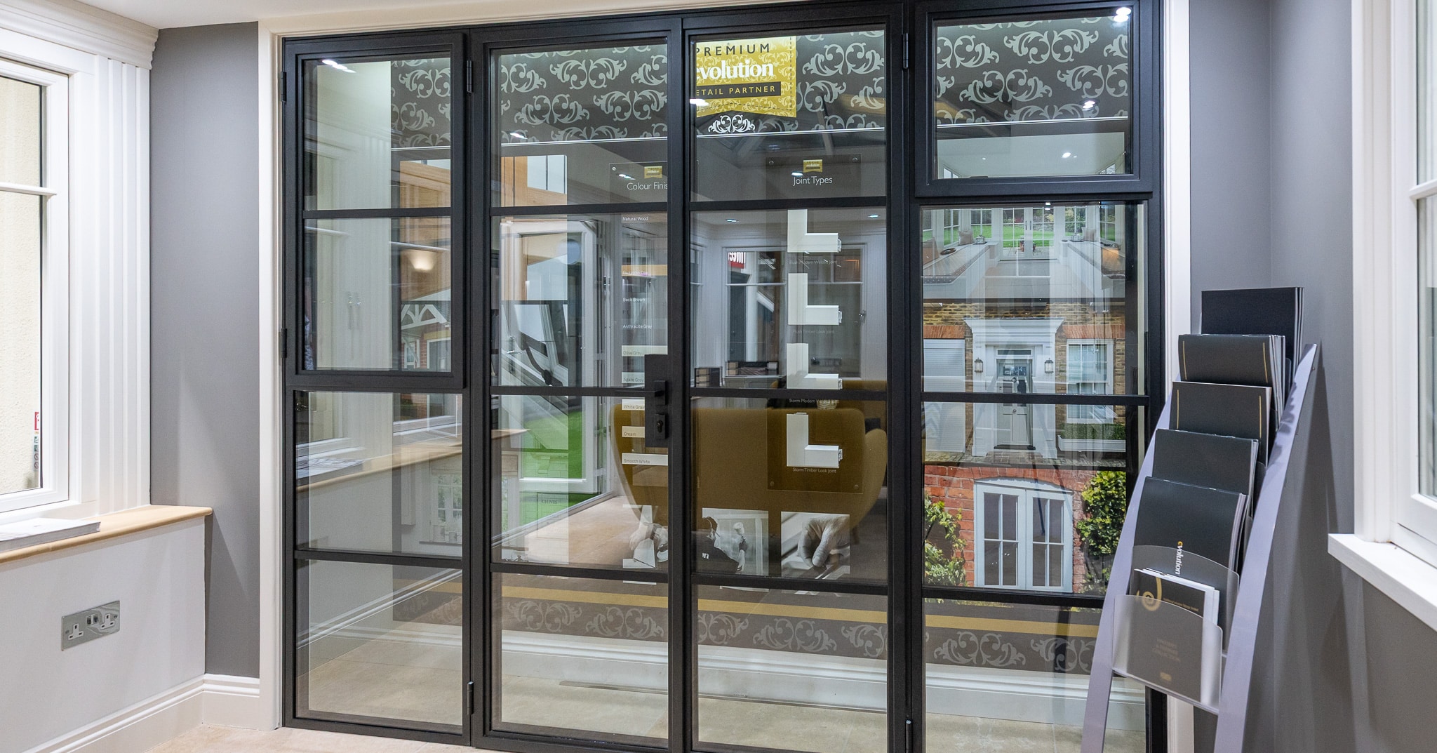 rk steel doors in the CBP showroom in black metal in the style of old metal doors and windows. 