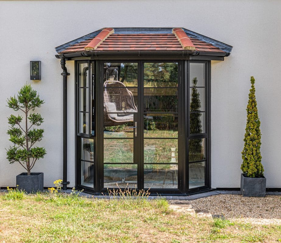 Aluco steel look patio doorsin black in a bay design