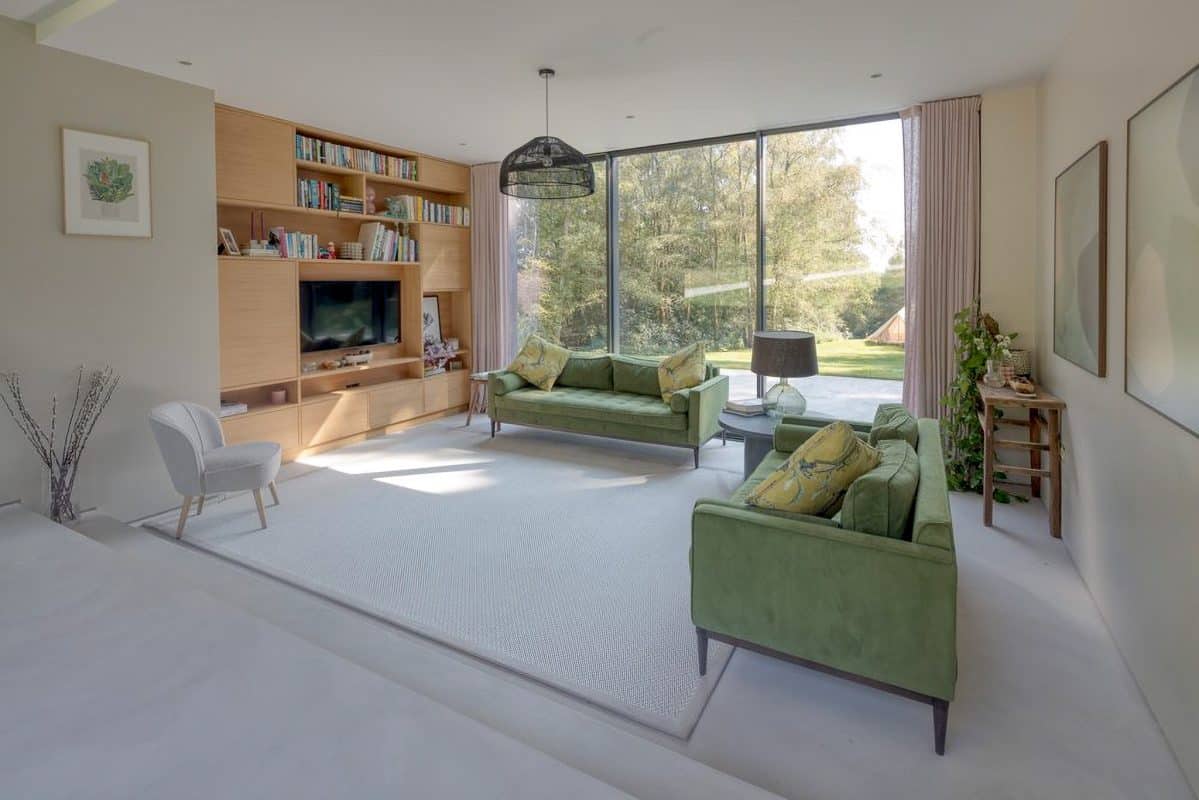 Solarlux sliding doors inn the cero II model grey in a stylish lounge with surrey countryside views. 