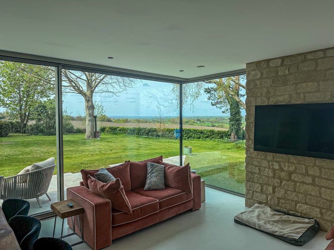 Solarlux Cero Corner Sliding Doors in a Contemporary New Build 5 inside view of cero sliding doors showing glazed corner