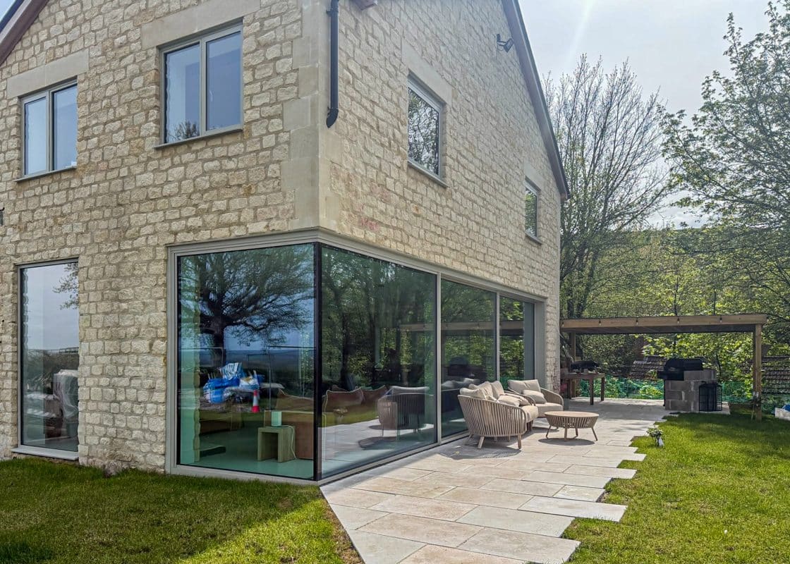 Solarlux Cero Corner Sliding Doors in a Contemporary New Build 4 cero sliding doors showing corner glass design
