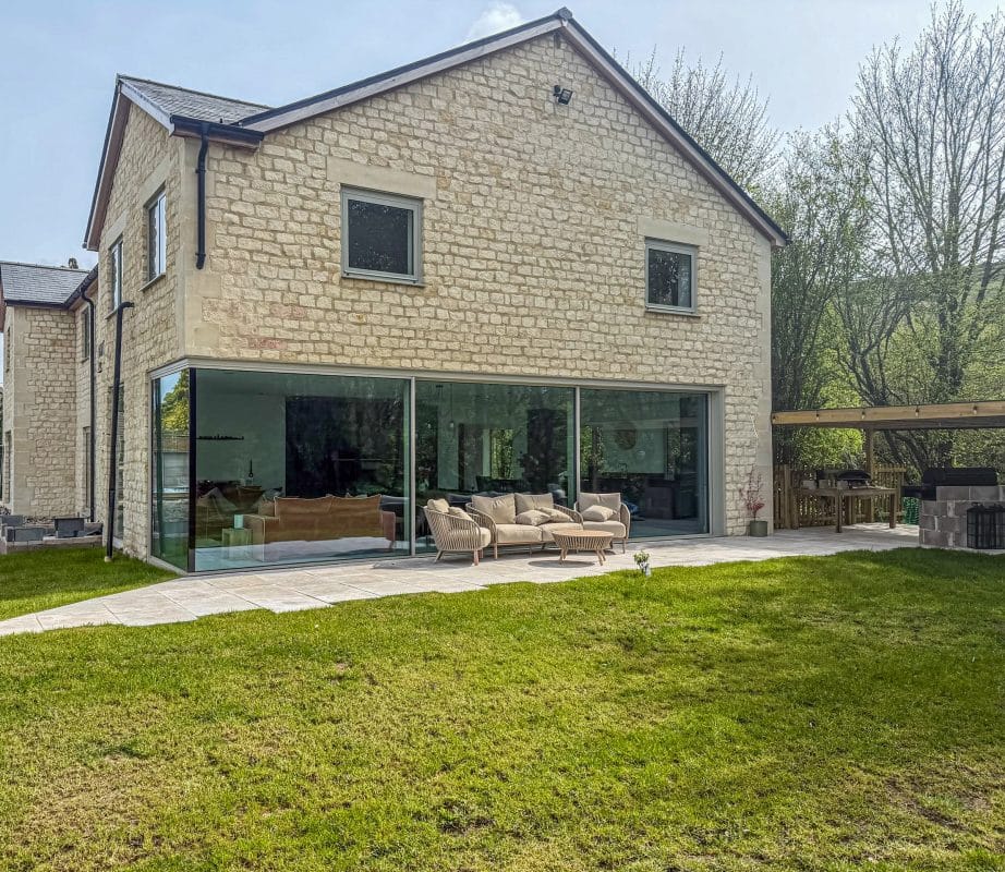 Solarlux Cero Corner Sliding Doors in a Contemporary New Build 2 cero corner sliding doors in light grey finish, chalet style house