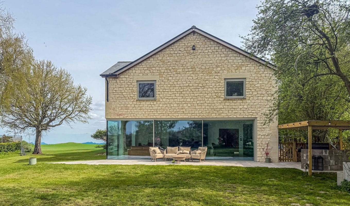 Solarlux Cero Corner Sliding Doors in a Contemporary New Build 6 gardeb view of sliding doors abnd windows